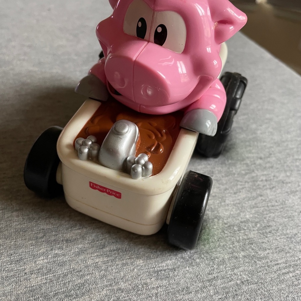 Fisher-Price Pink Hippo Push Car with White Base and Black Wheels